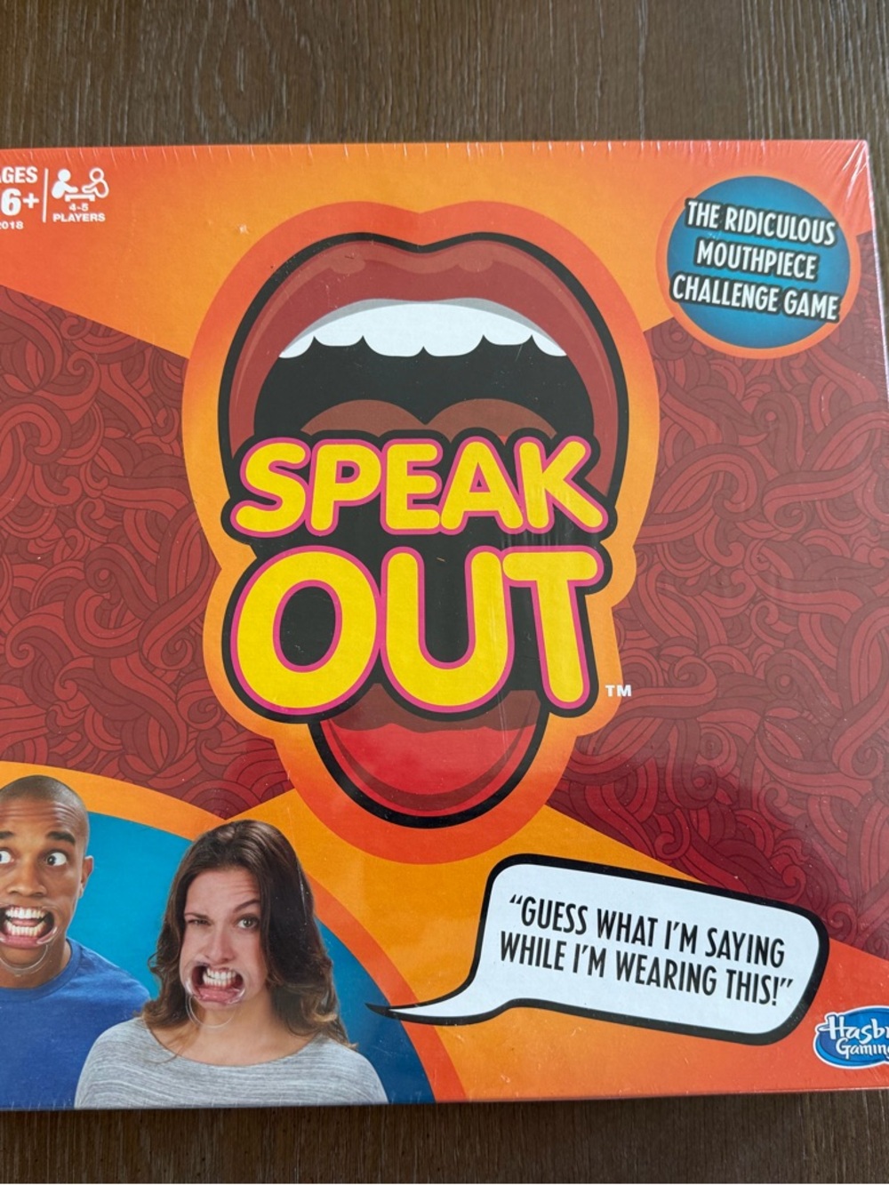 Speak Out Party Game by Hasbro Gaming - Orange & Red Box